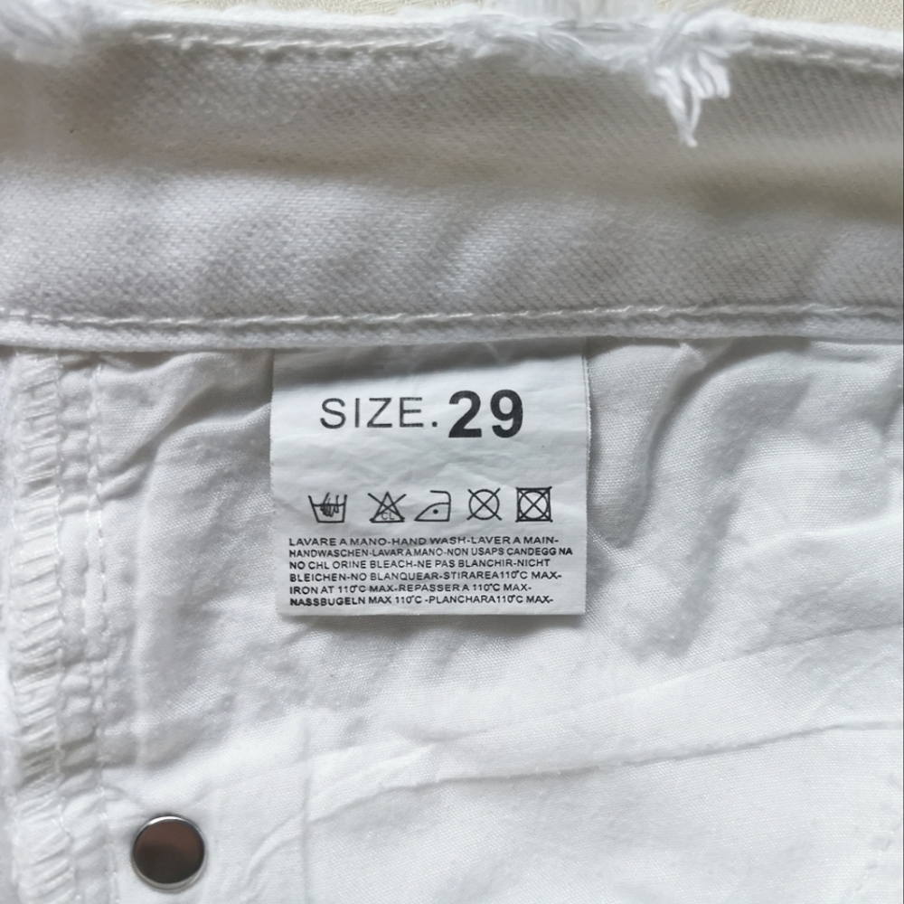 White distressed jean shorts. - Picture 4 of 6
